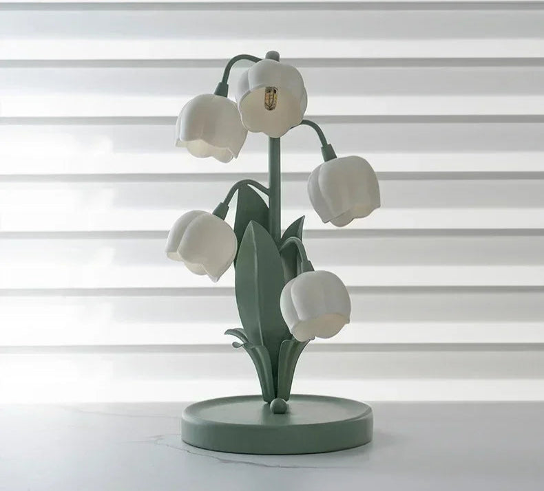Unlit Nordic Atmosphere LED Table Lamp showing tulip-shaped design and green base, ideal for modern floral-themed interiors.