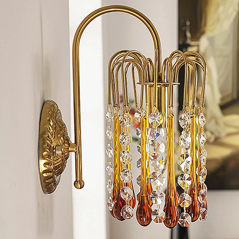 Elegant Teardrop Crystal Wall Lamp in copper with amber and clear crystal accents, ideal for upscale home lighting fixtures.