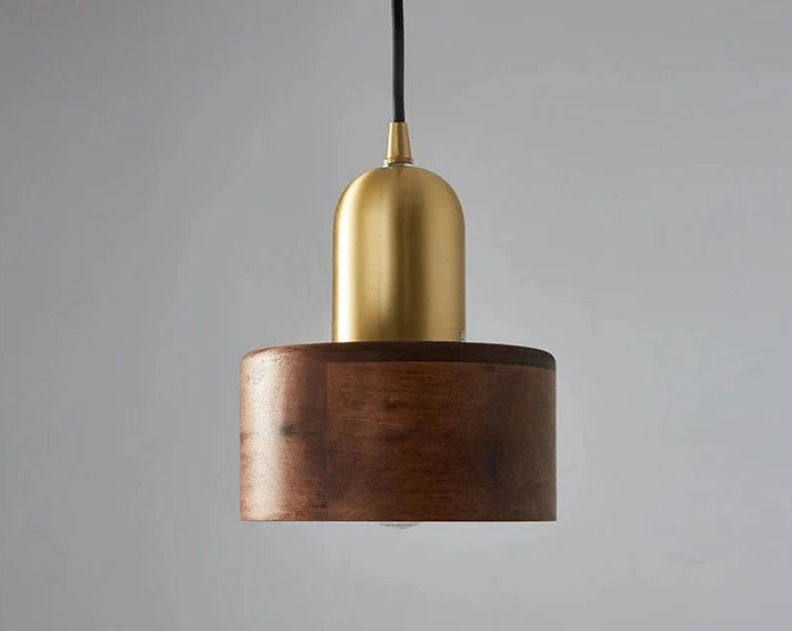 Front view of LUXELY vintage pendant light with smooth walnut wood and brushed brass finish, perfect for modern interiors.