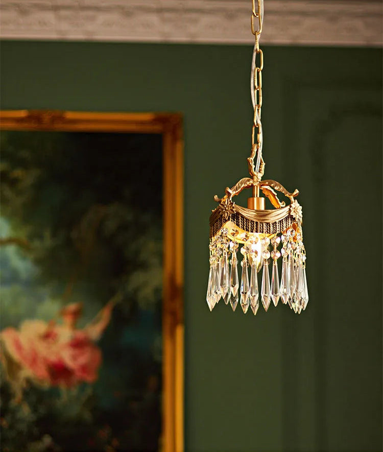 French Velvet Tassel Pendant Light with crystal prisms, adding vintage elegance to a green-walled interior.