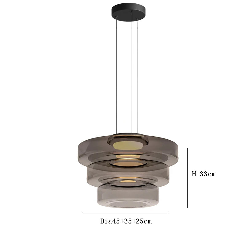 Smoke grey three-tier glass pendant light with 45cm, 35cm, and 25cm diameters. LED lighting for upscale kitchen or dining.