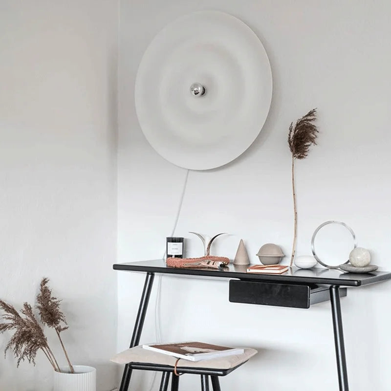 Modern round bedroom sconce
