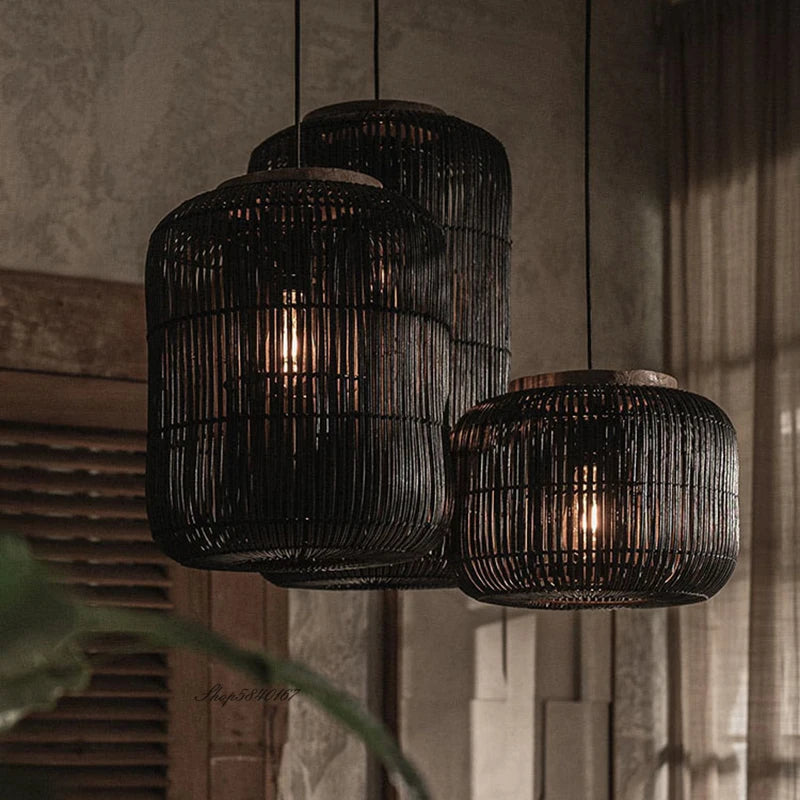 Black LUXELY retro rattan pendant lights in a cozy japandi-style room, ideal for restaurant or hotel ceiling lighting.