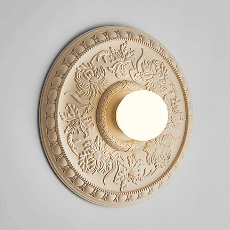 Retro round wall lamp in beige with intricate imperial floral detailing, perfect for vintage-style living room or dining space.