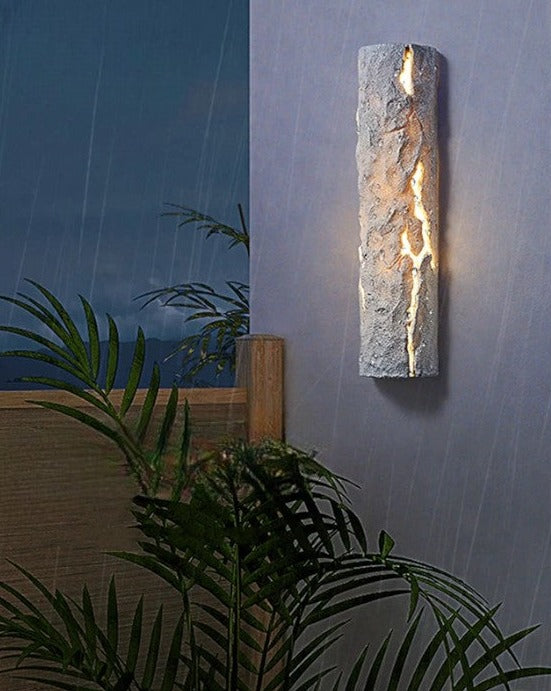 White LED Resin Wall Lamp on rainy night, IP65 waterproof rating ensures durability, perfect for outdoor wall lighting in all weather.