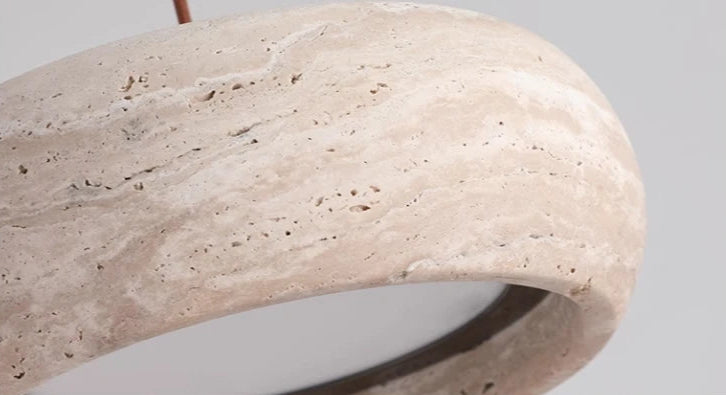 Close-up of Travertine Stone LED Pendant Light – Modern Fixture showing natural stone texture and integrated LED lighting.