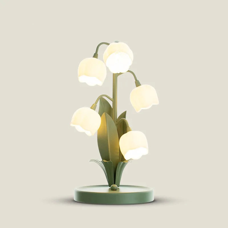 Nordic Atmosphere LED Table Lamp with flower-shaped lampshades and green base, perfect for bedside or living room ambient lighting.