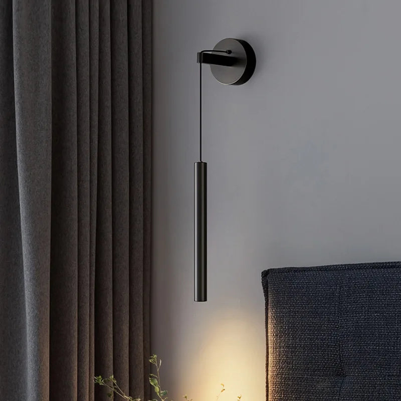 Adjustable bedside sconce