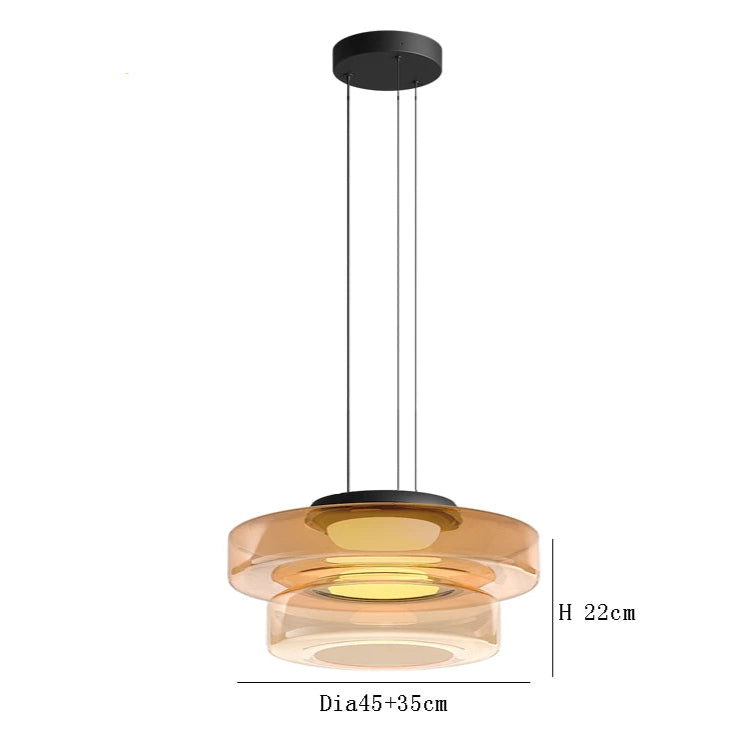 Amber two-tier glass pendant light with 45cm and 35cm diameters. Adjustable hanging wire and LED lighting for luxury interiors.