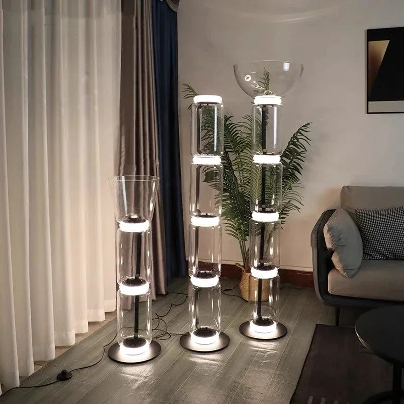 Three Italian glass floor lamps – modern minimalist nordic design with varying LED-lit glass sections for stylish home decor.