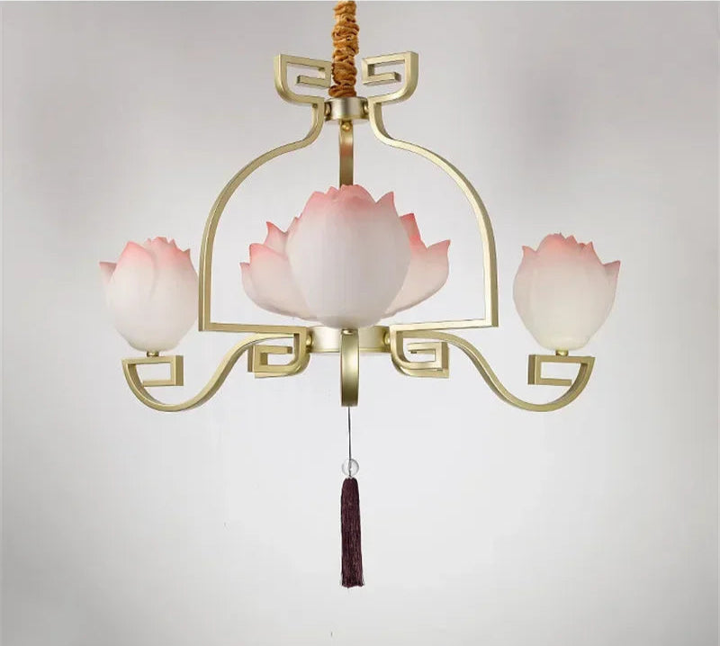 Three-light lotus flower LED pendant light with soft pink petals and gold frame, perfect for cozy vintage spaces.
