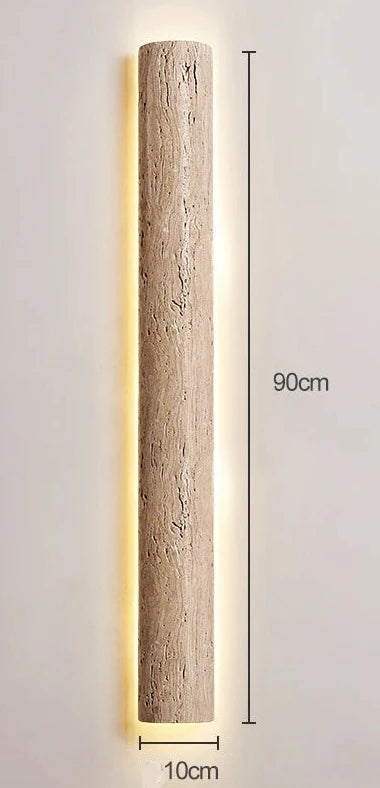 90cm rod-shaped IP65 travertine wall light with 10cm width, ideal for outdoor lighting in modern architectural settings.