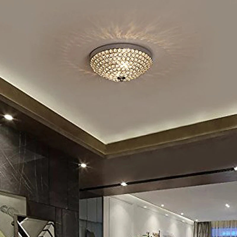 Modern crystal ceiling light installed in a stylish living room, enhancing interior with elegant LED illumination.