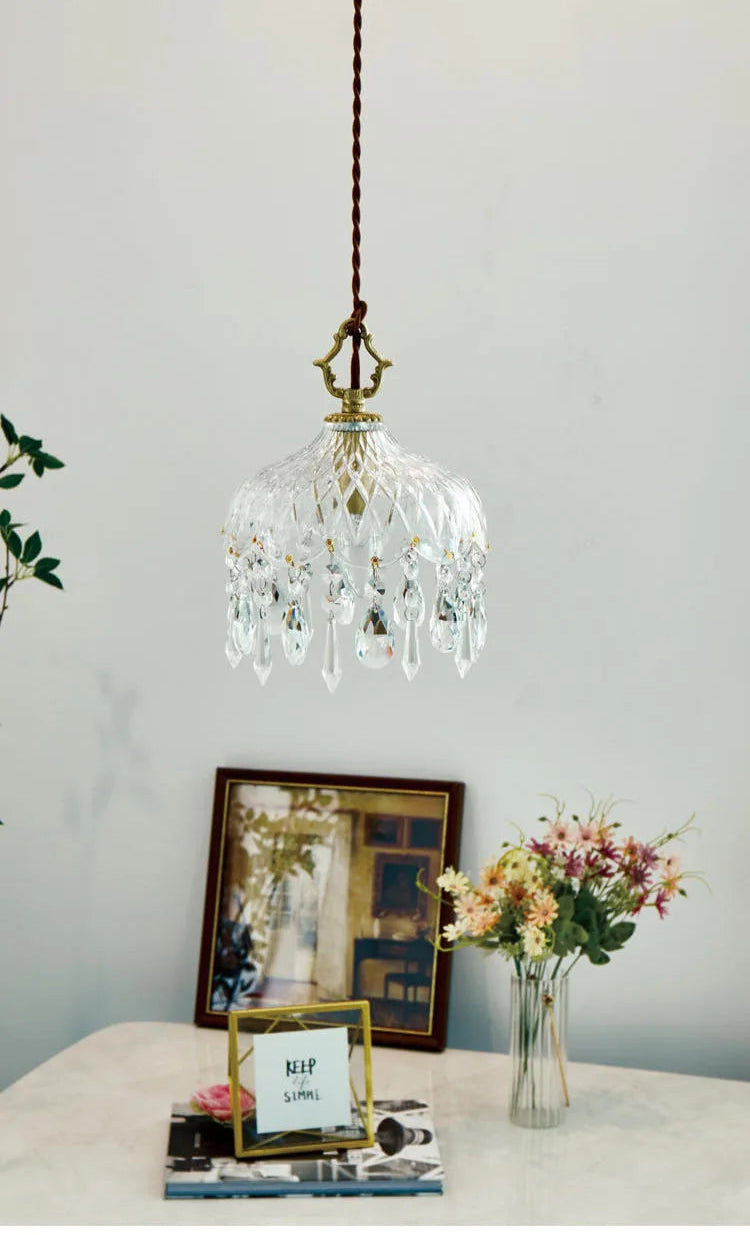 French Vintage Crystal Chandelier - Copper Hanging Lamp above table with flowers, ideal for romantic and vintage decor themes.