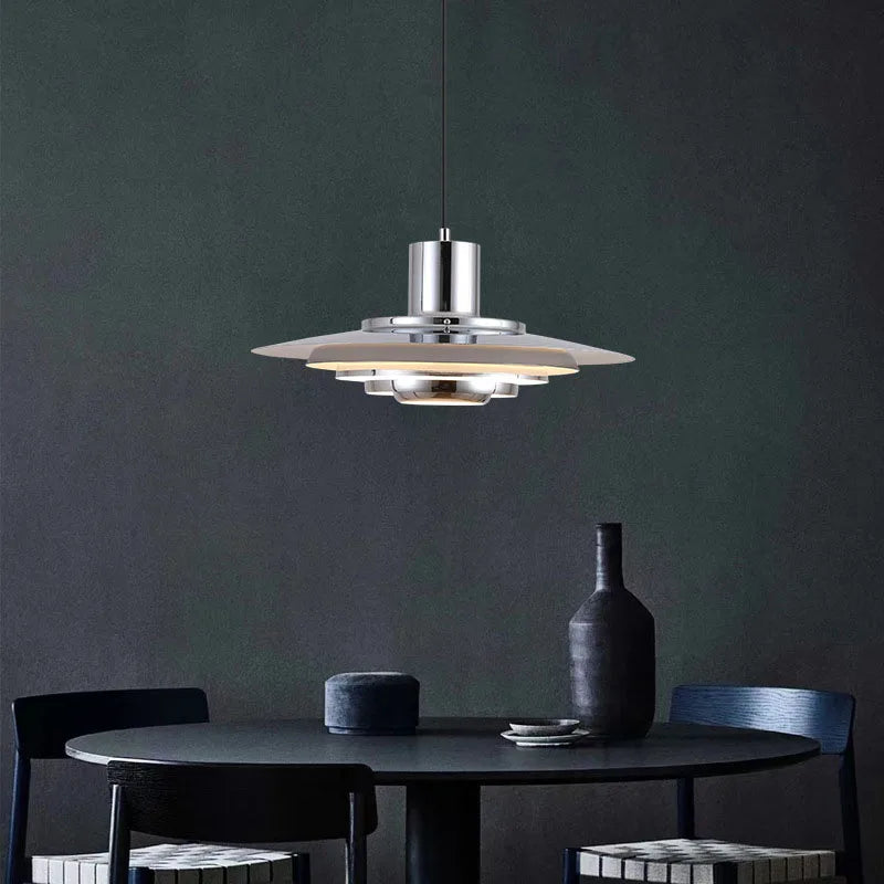 Modern dining area featuring Silver Cord Pendant Light - E27 Art Lamp, perfect for stylish kitchen and bar lighting with metal finish.