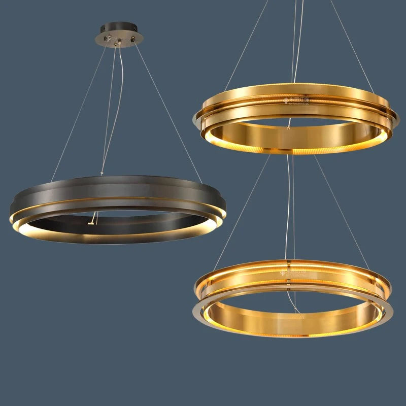Three minimalist LED ring chandeliers in gold and gun black, showcasing modern ceiling light options for home interiors.