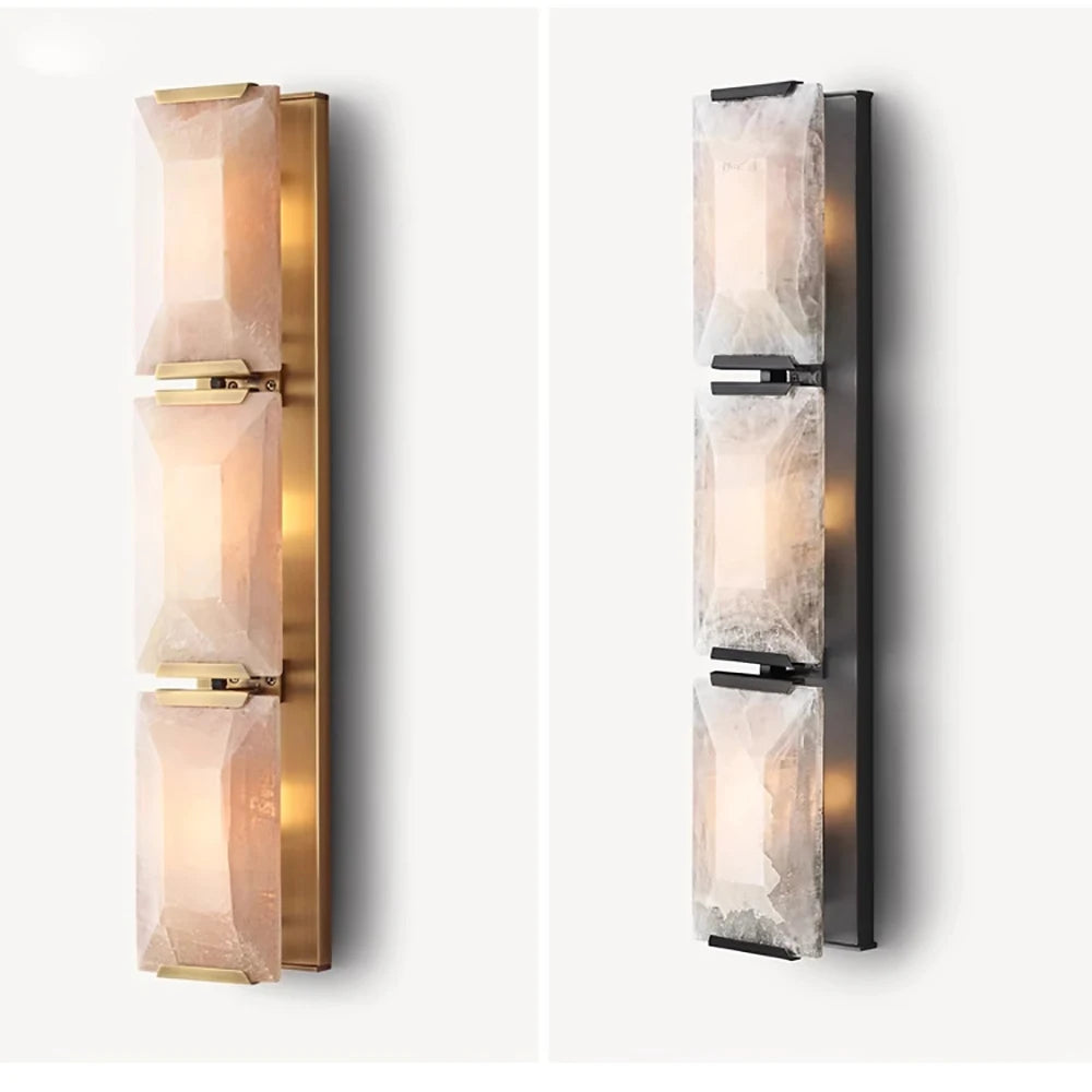 Side-by-side comparison of Copper Marble LED Sconces in gold and black finishes, highlighting material and design options.