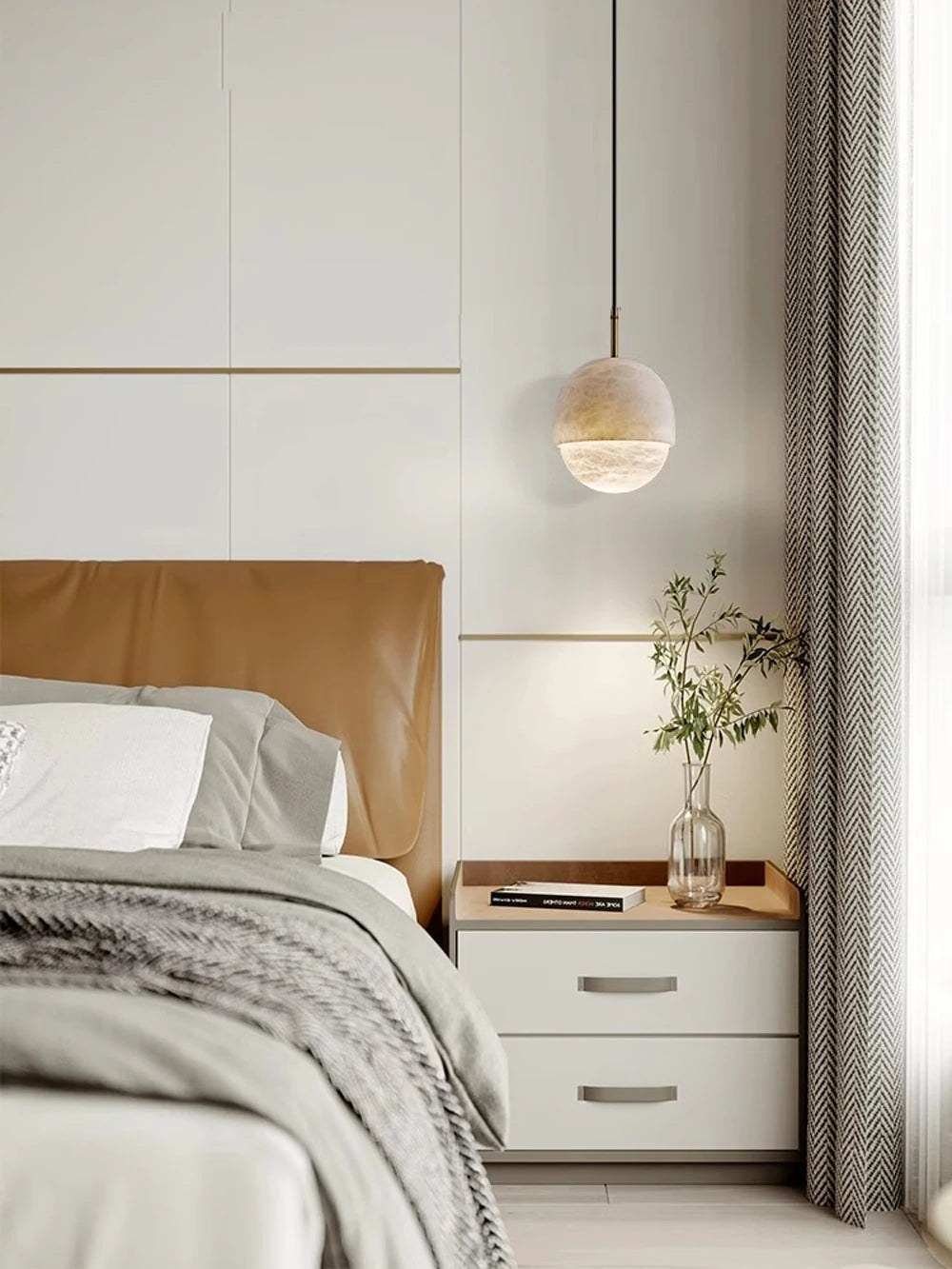 Single round marble LED pendant light beside a bed. Marble LED pendant light – modern ceiling lamp dimmable for bedside elegance.
