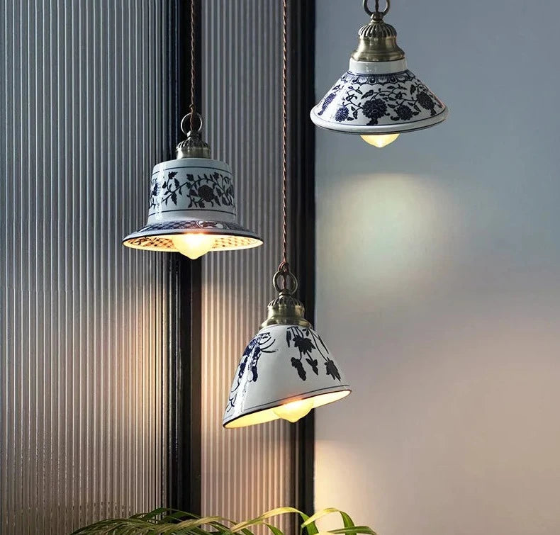 LUXELY ceramic LED pendant lights with vintage floral design hanging in a modern dining area, perfect for farmhouse interiors.