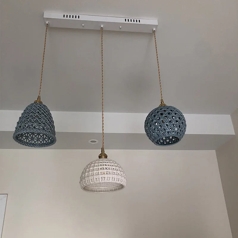 Ceiling-mounted LUXELY ceramic Japanese pendant lights in blue and white, adding elegance to modern home lighting setups.
