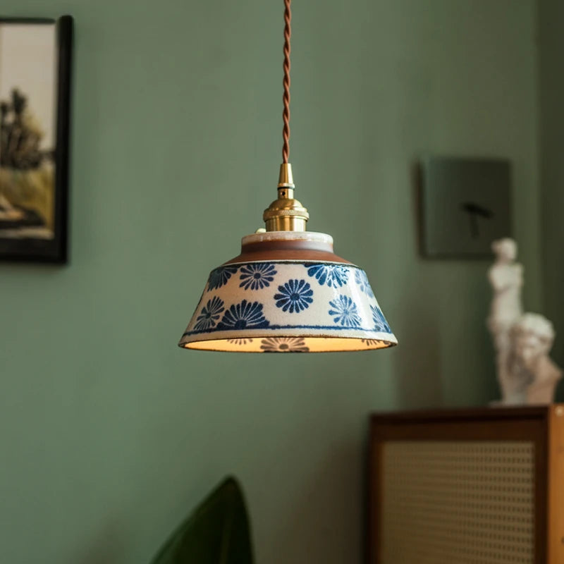 Retro Chinese Porcelain Pendant Light featuring hand-painted blue flowers. Perfect for cozy restaurant or home lighting ambiance.