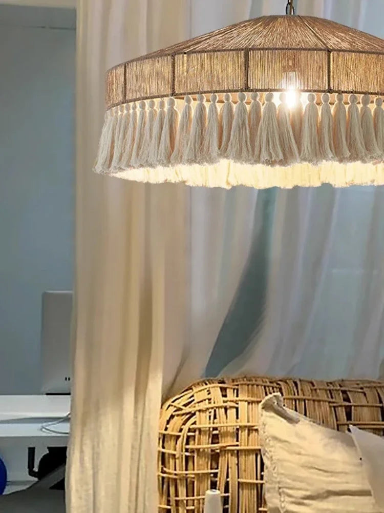 Retro VIGOUS Rattan Pendant Light above a rattan chair, blending natural textures and soft light for a cozy interior atmosphere.