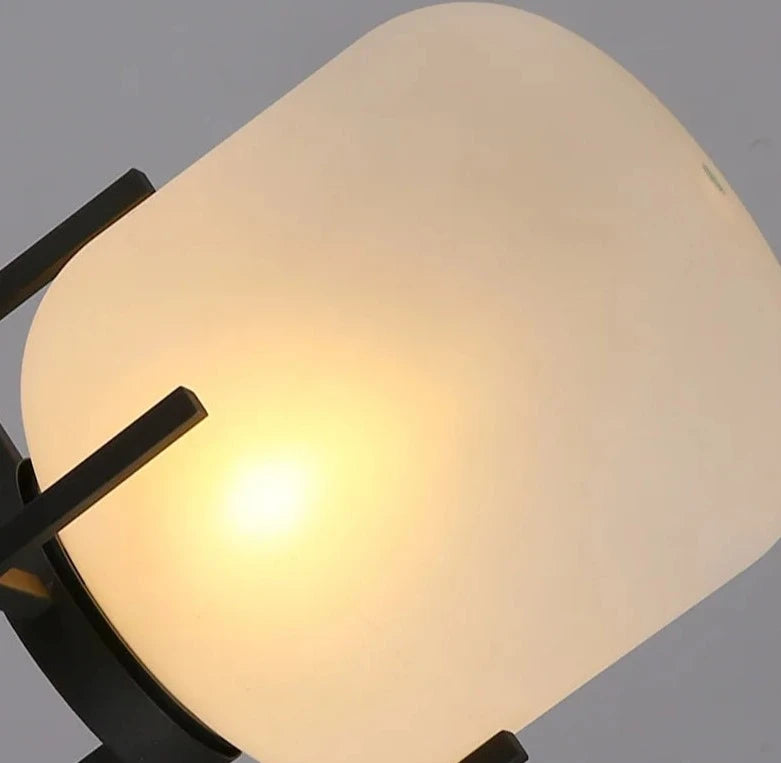 Detailed view of LUXELY garden light’s frosted glass shade emitting warm light, ideal for outdoor ambiance.