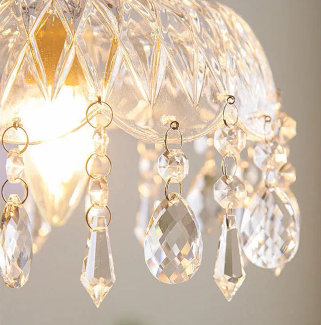 Close-up of crystal detailing on French Vintage Crystal Chandelier - Copper Hanging Lamp, reflecting warm ambient light.