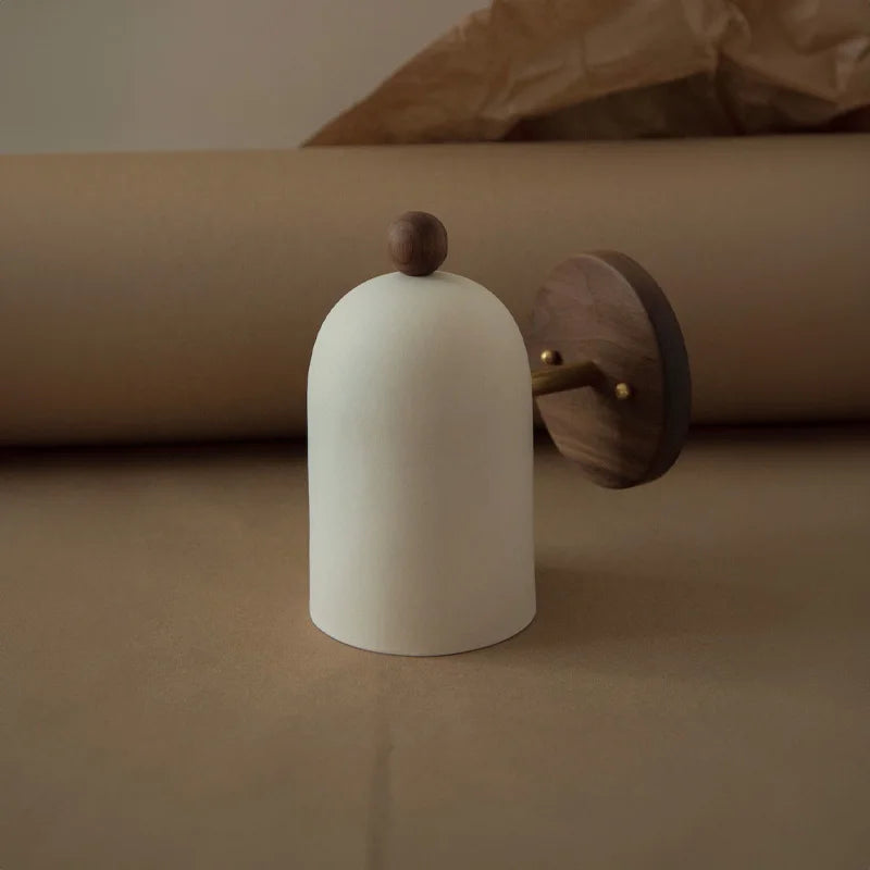 LUXELY wabi-sabi style wall lamp with white dome and walnut wood base, styled on neutral background for modern interiors.