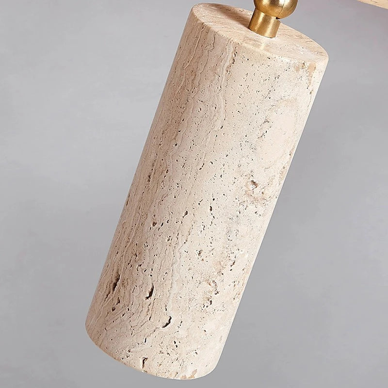 Close-up of stone-textured spotlight head from the LUXELY ceiling lamp, highlighting its natural material and cylindrical design.