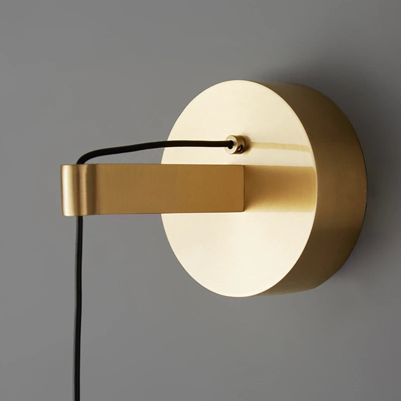 Adjustable bedside sconce