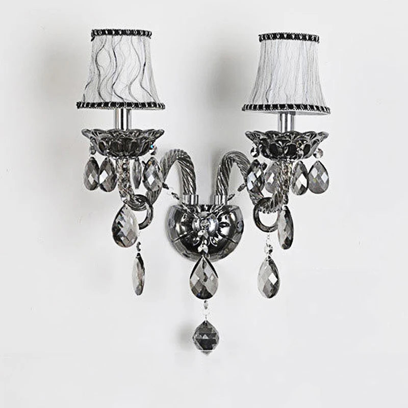 Vintage crystal wall lamp with dual black fabric shades and dark lotus sconces, perfect for French-inspired home decor.