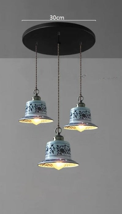 Three bell-shaped ceramic pendant lights with blue floral design on a 30cm round base, ideal for vintage kitchen décor.