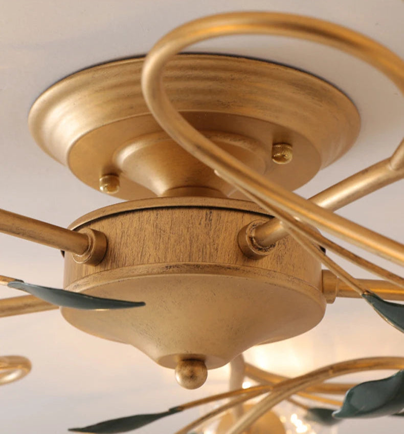 Close-up of gold ceiling mount base on French Floral Ceiling Light, showing durable metal construction and elegant swirl design.