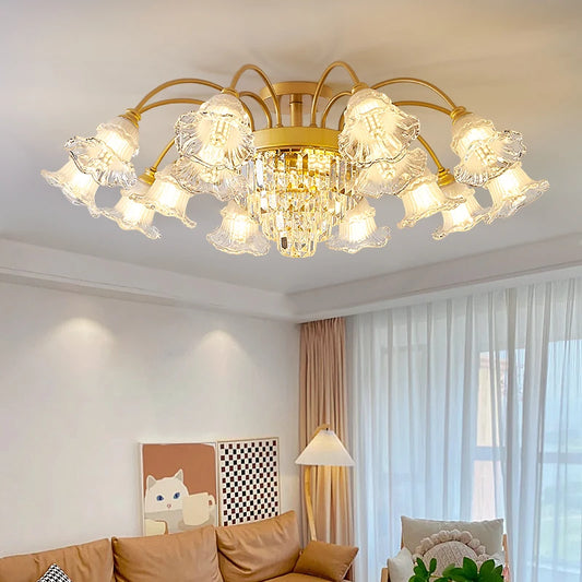 Modern crystal chandelier with gold finish and LED tulip glass shades in a cozy living room. High-efficiency lighting fixture, CCC and CE certified.