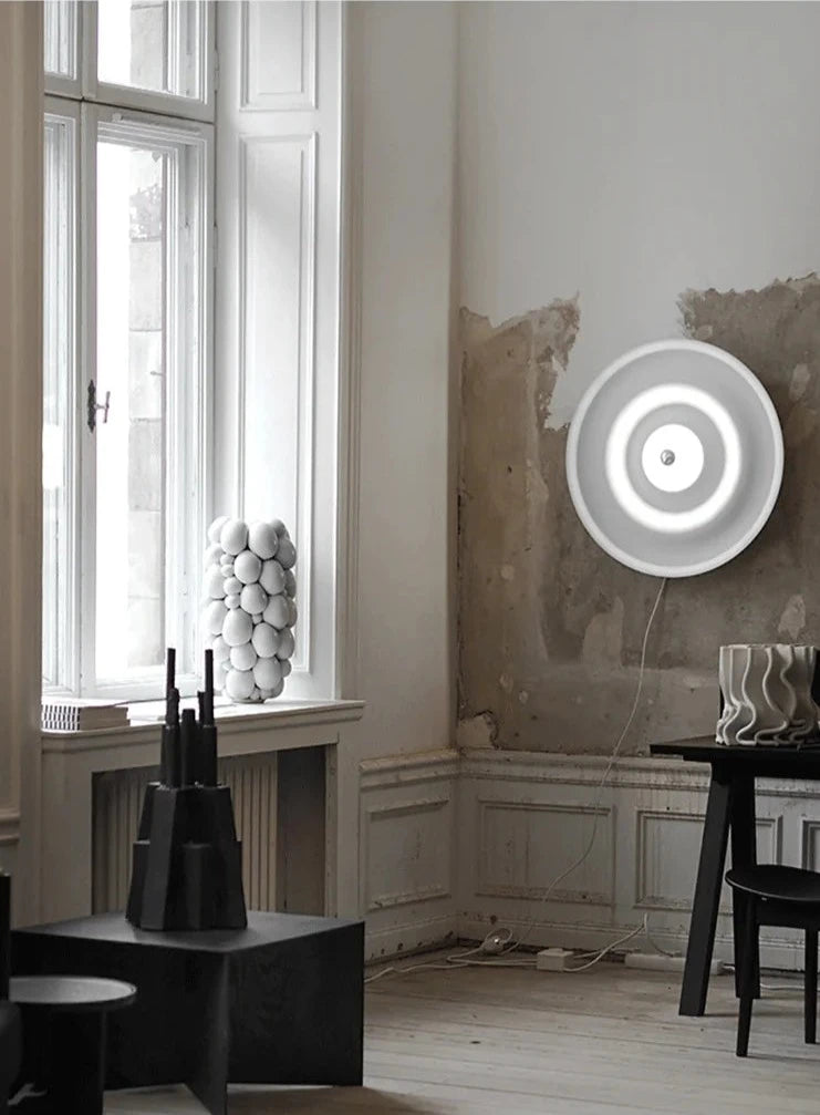 Modern round bedroom sconce