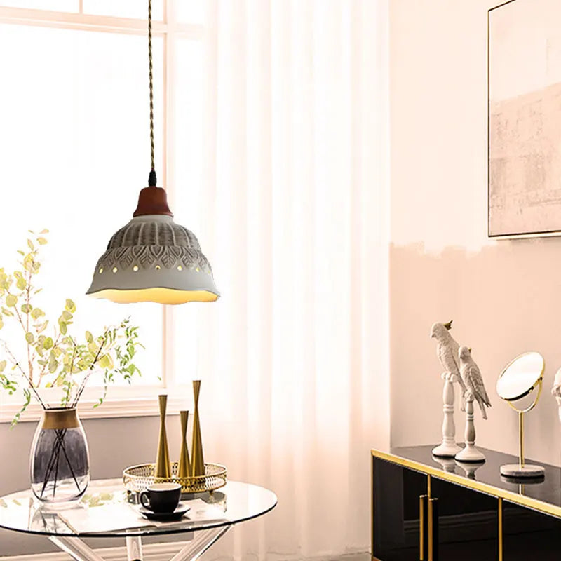 Nordic Ceramic Chandelier - LED Pendant Light Vintage lighting a modern living room with gold accents and natural sunlight.