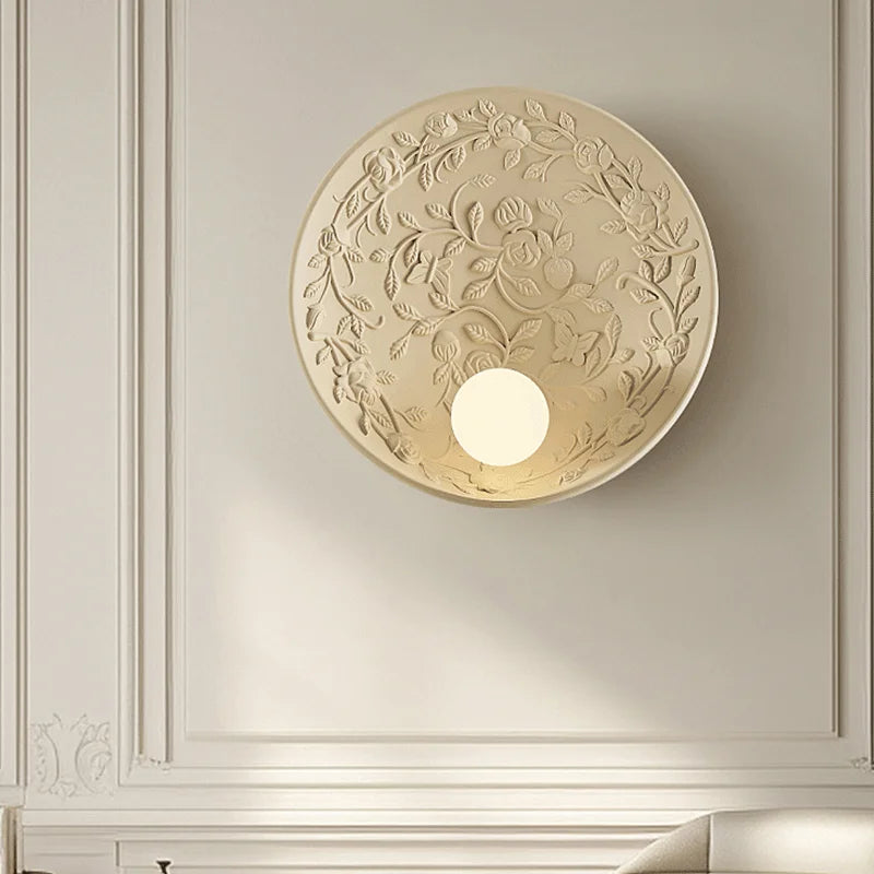Round art deco wall sconce with rose motif, vintage imperial style ideal for upscale dining or living room ambiance.