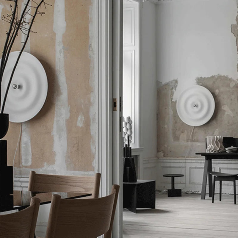 Modern round bedroom sconce