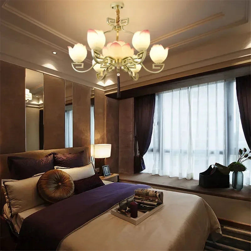 Vintage lotus flower LED pendant light adding a soft glow to a cozy bedroom, ideal for ambient lighting.