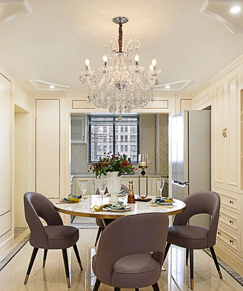 Nordic Crystal Chandelier - Luxury Pendant Light installed above a dining table in a modern kitchen, enhancing the space with elegance.