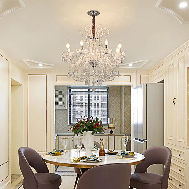 8-Head Nordic Crystal Chandelier - Luxury Pendant Light illuminating a dining area with soft, ambient lighting and crystal detailing.