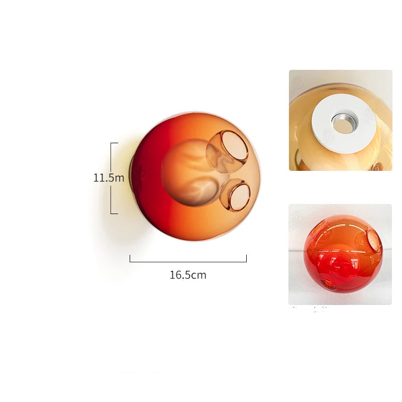 Gradient red glass ball LED wall light, Italian designer fixture for bold and artistic bedroom or café lighting.