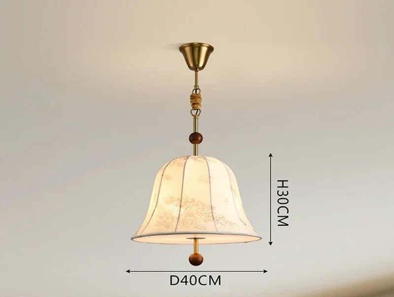 Modern Art Hanging Lamp with bell-shaped cloth shade and wood trim, a Nordic pendant light for cozy dining areas.