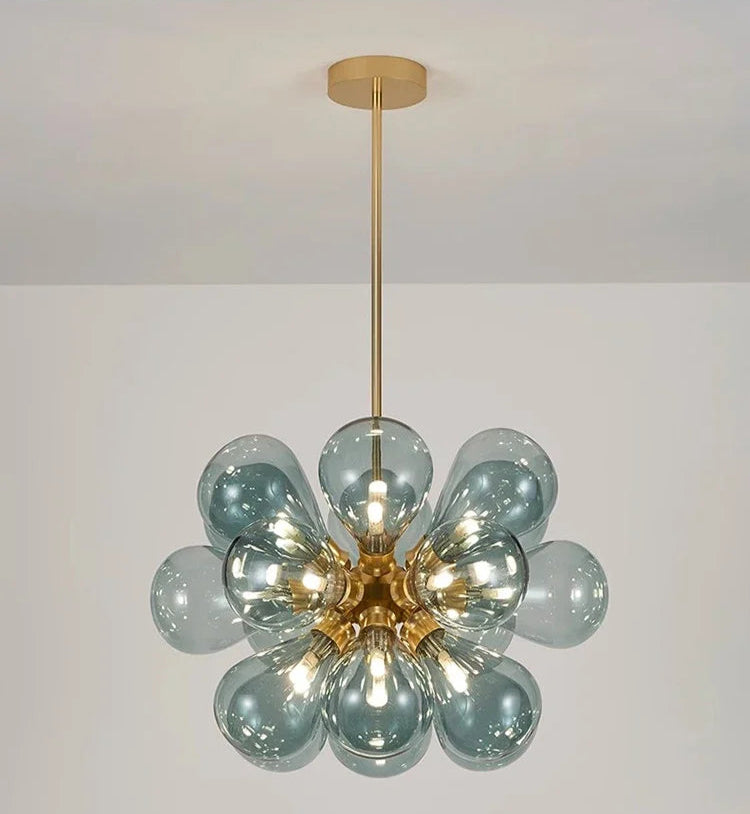 Blue bubble glass chandelier with golden lampbody, showcasing a Nordic design ideal for stylish ceiling lighting.