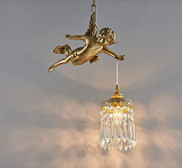 Close-up of copper angel chandelier light with LED bulb and crystal drops, perfect for elegant home lighting.