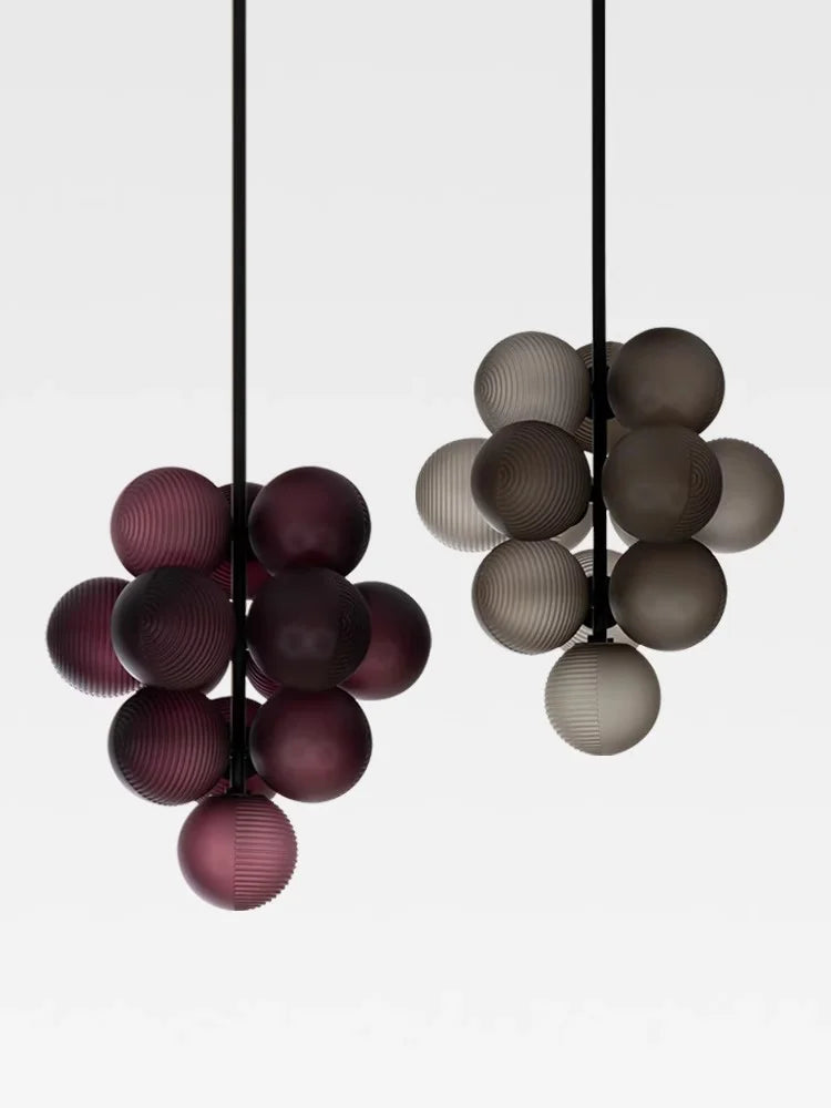 Grape LED Chandelier - Purple Glass Light in art deco style with stainless steel rods and clustered orbs, ideal for modern interiors.
