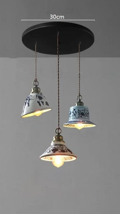 Assorted ceramic pendant lights with floral patterns on a 30cm base, perfect for farmhouse kitchen or dining lighting.