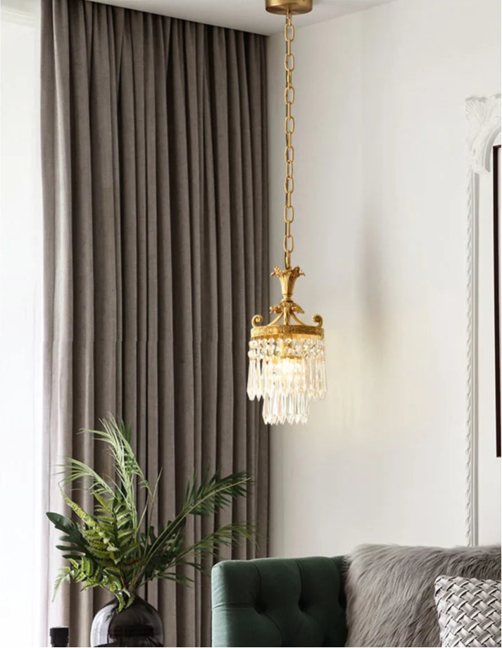 Retro French copper crystal chandelier hanging in a modern living room, blending classic elegance with contemporary decor.