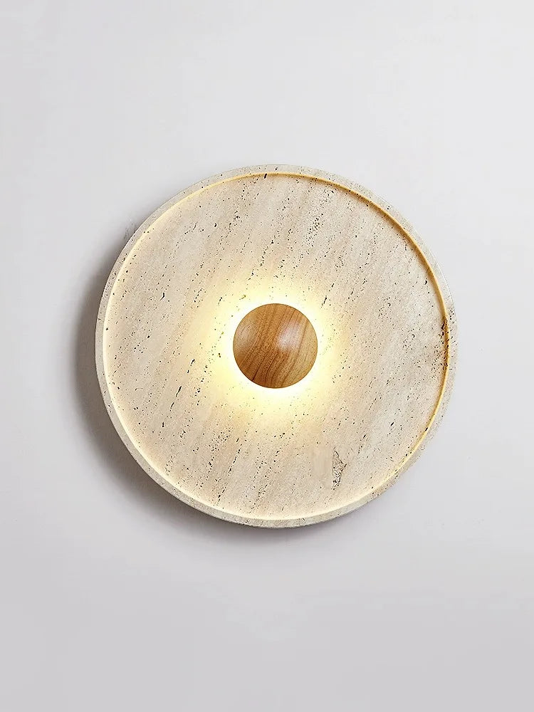 Elegant Japanese wall lamp with circular travertine sconce and warm LED light, ideal for hallway or restaurant decor.